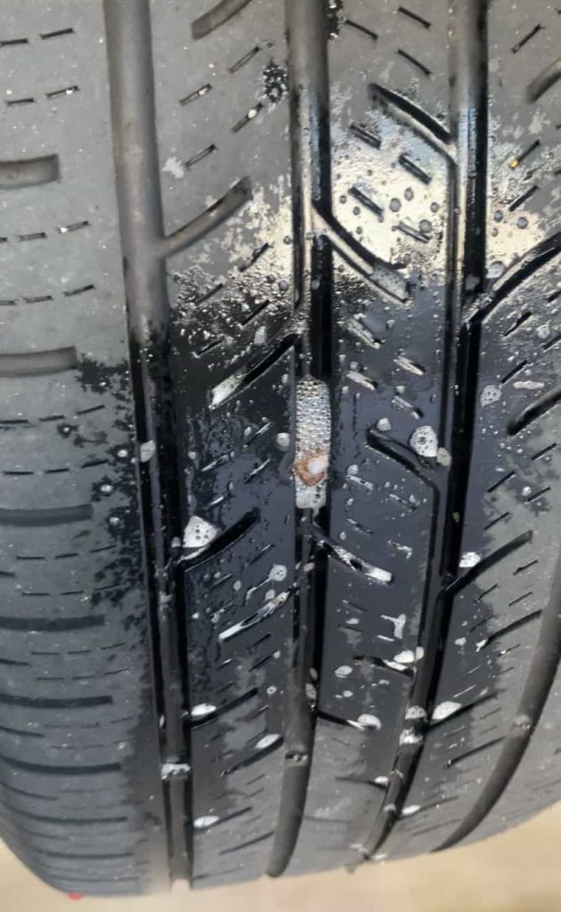 BUBBLES FROM LEAKING TIRE TREAD