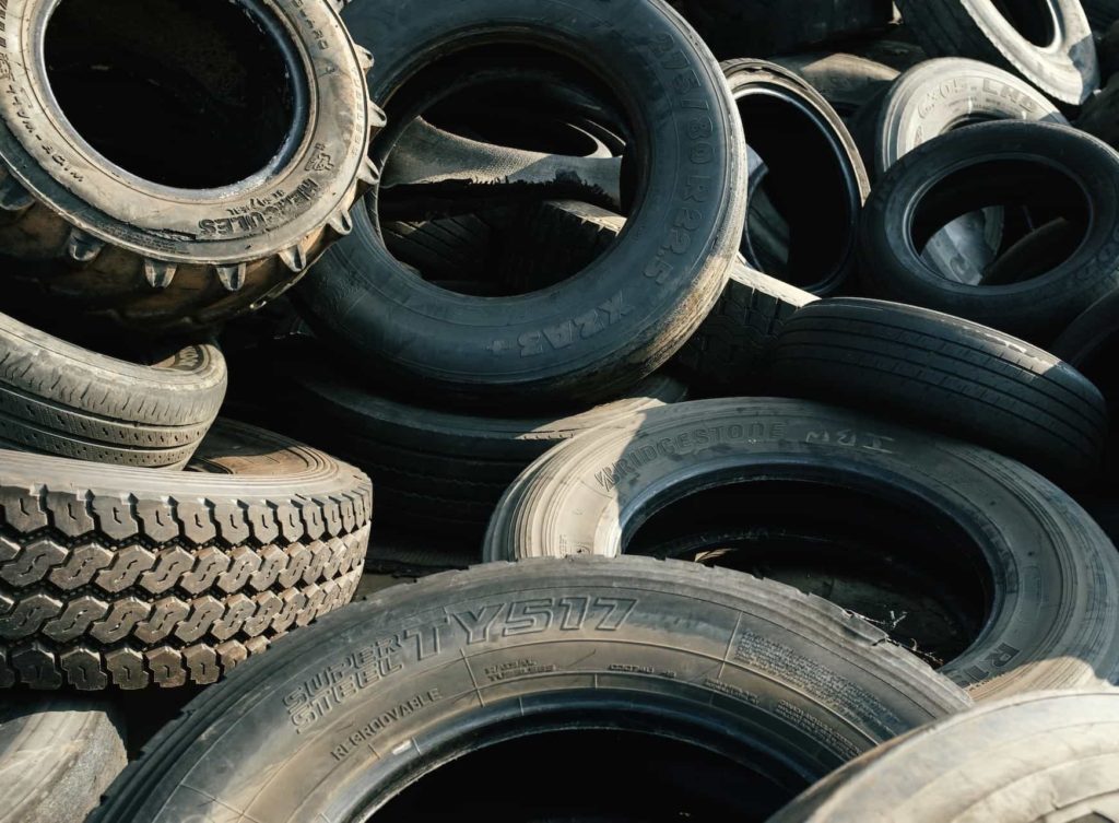 PILE OF USED TIRES