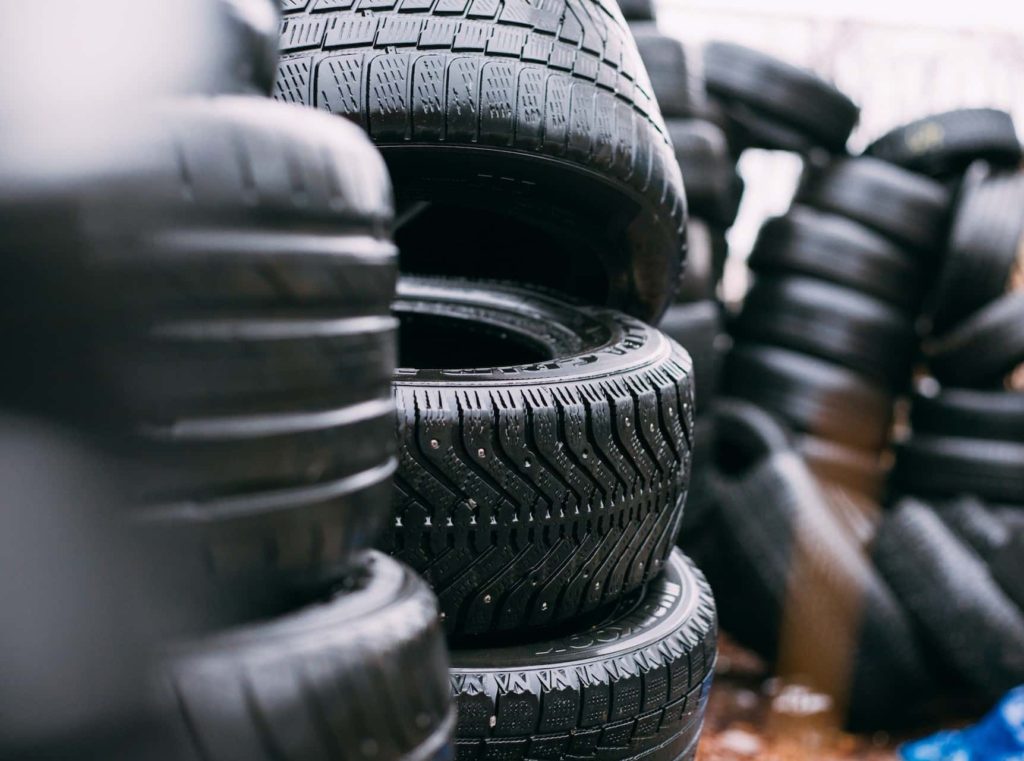 STACKS OF USED TIRES