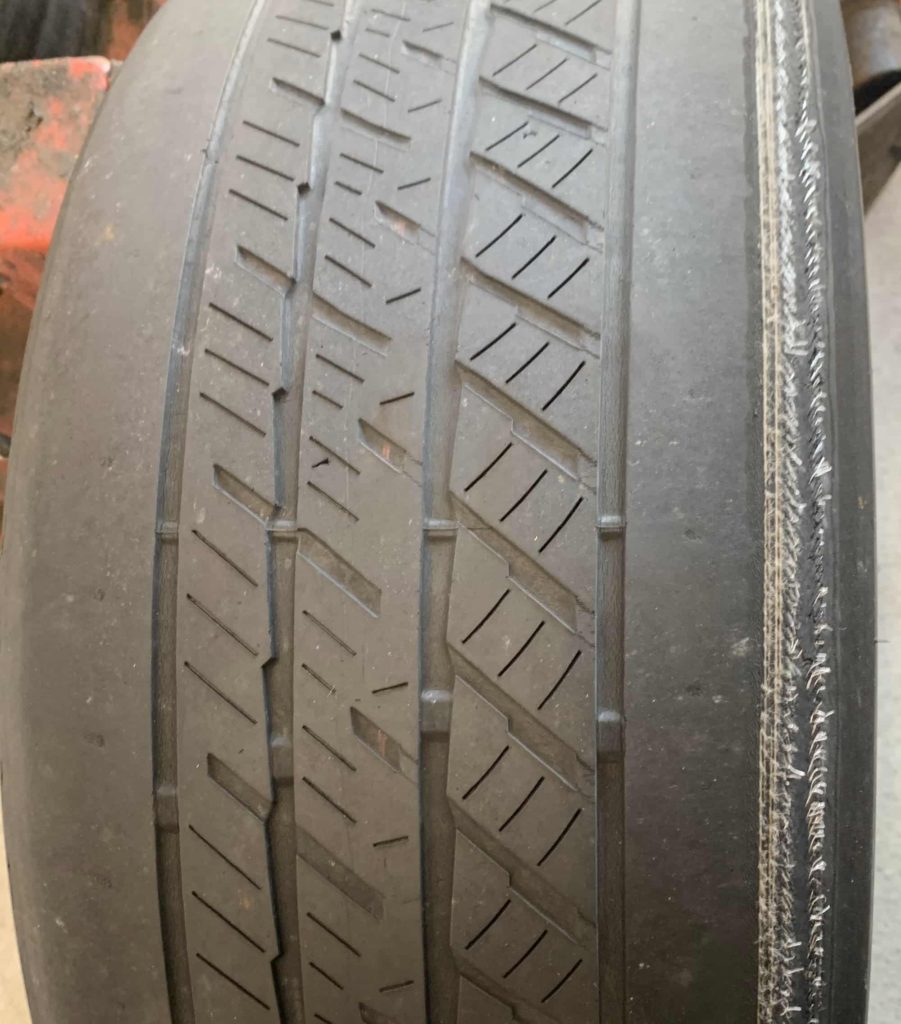 TIRE STEEL BELT THROUGH TIRE