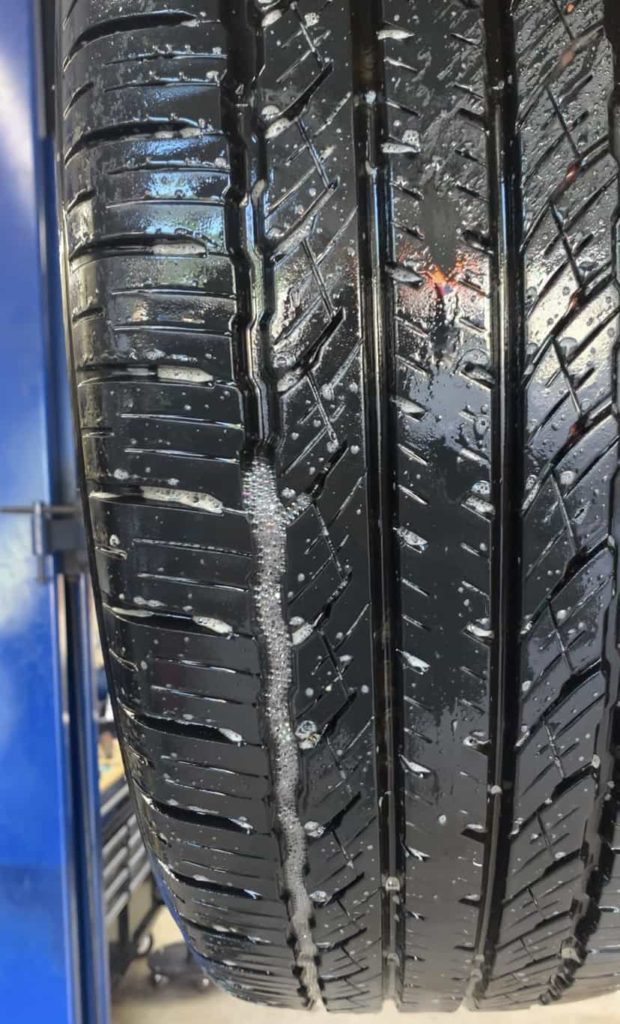 TIRE TREAD LEAK WITH SOAP
