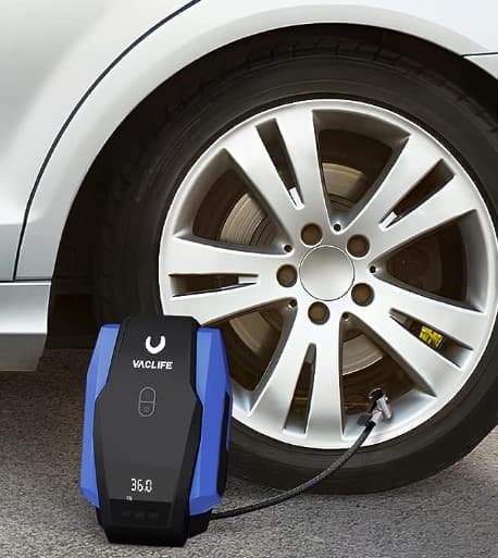 PORTABLE TIRE PRESSURE PUMP INFLATING TIRE