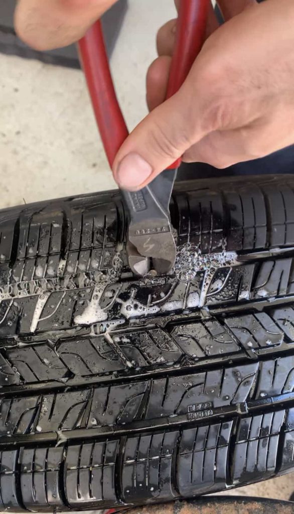 REMOVING NAIL FROM TIRE