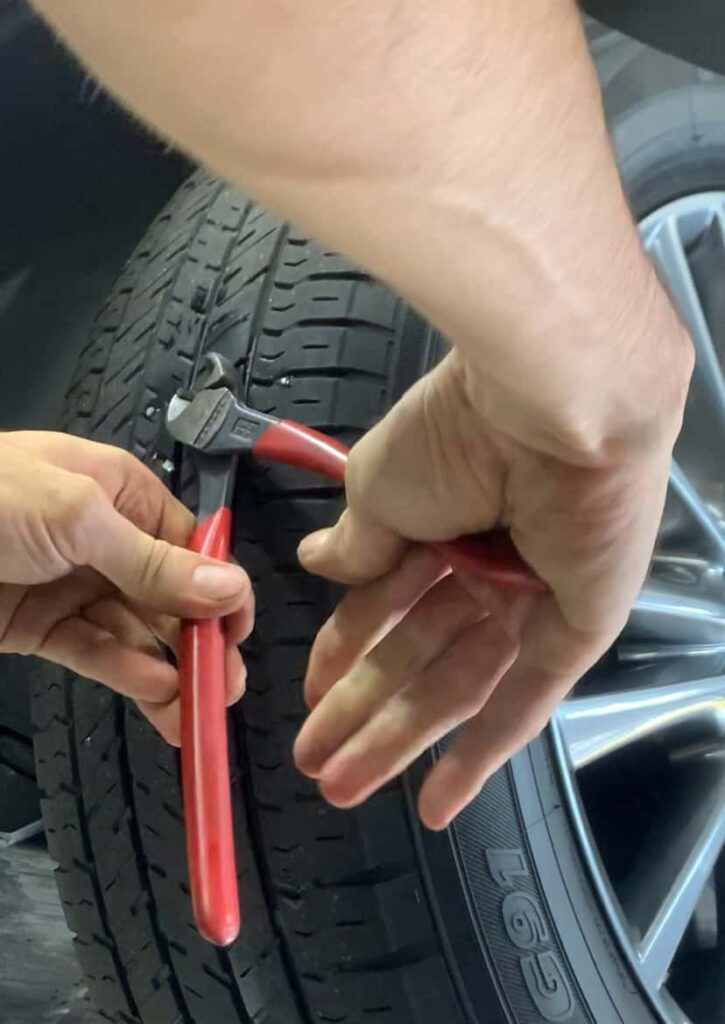 TRIMMING AND CUTTING THE TIRE PLUG