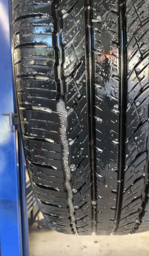 FIND A LEAKING TIRE WITH SOAP AND WATER