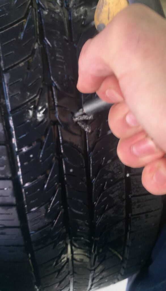 INSERT TIRE PLUG INTO TIRE