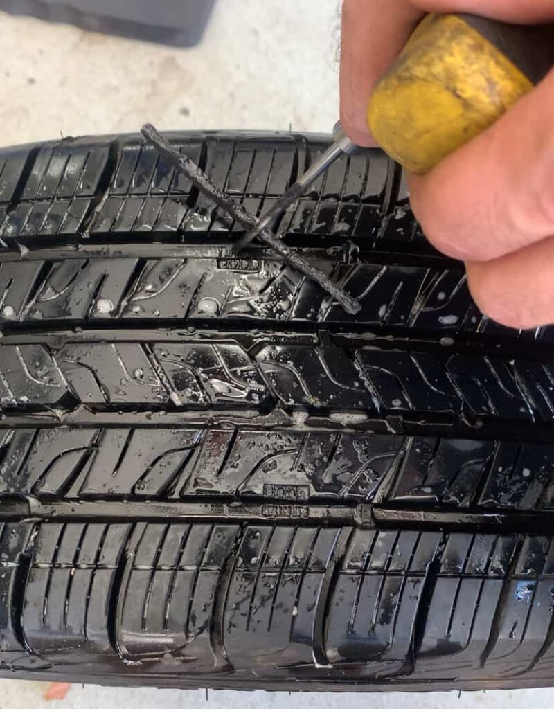 INSERTING TIRE PLUG INTO TIRE HOW TO PLUG A TIRE