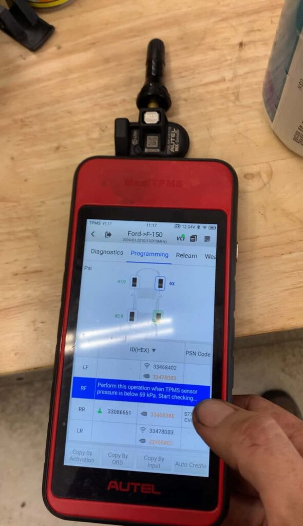 TIRE PRESSURE SENSOR PROGRAMING WITH TOOL