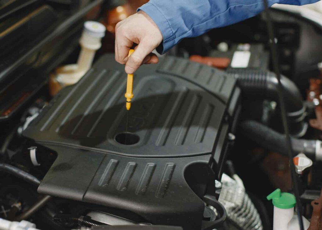 CHECKING OIL DIPSTICK